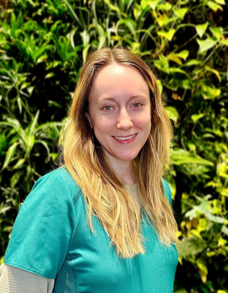 Leigh Harlow portrait with green background