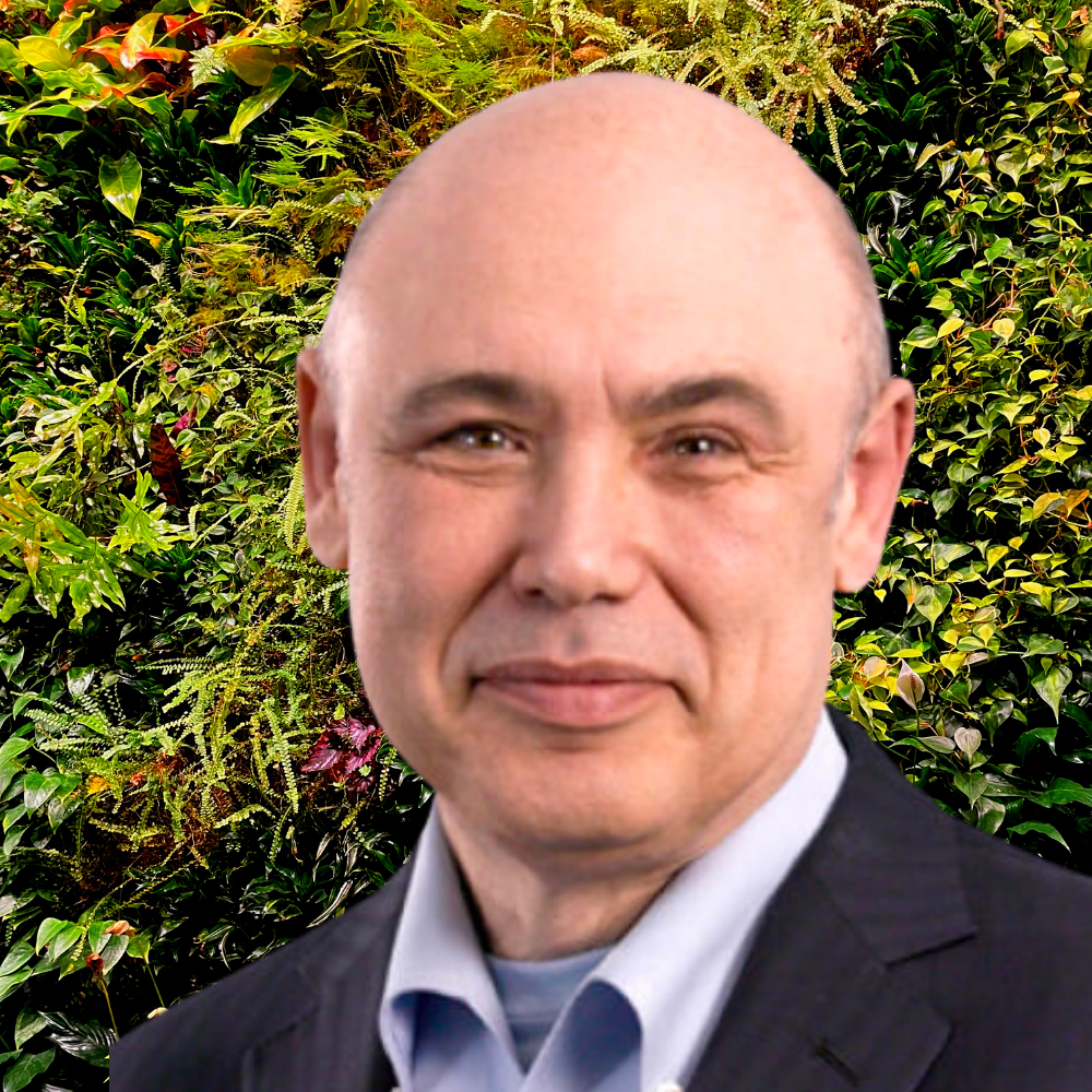 portrait of Dr. Eugene Lipov against a green background